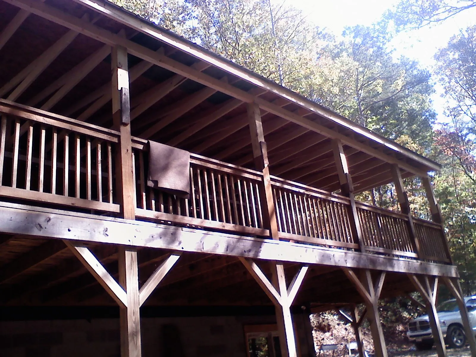 Timber framing under a new elevated porch and deck — Roof Leak Repair in Islip by Roofing Brothers